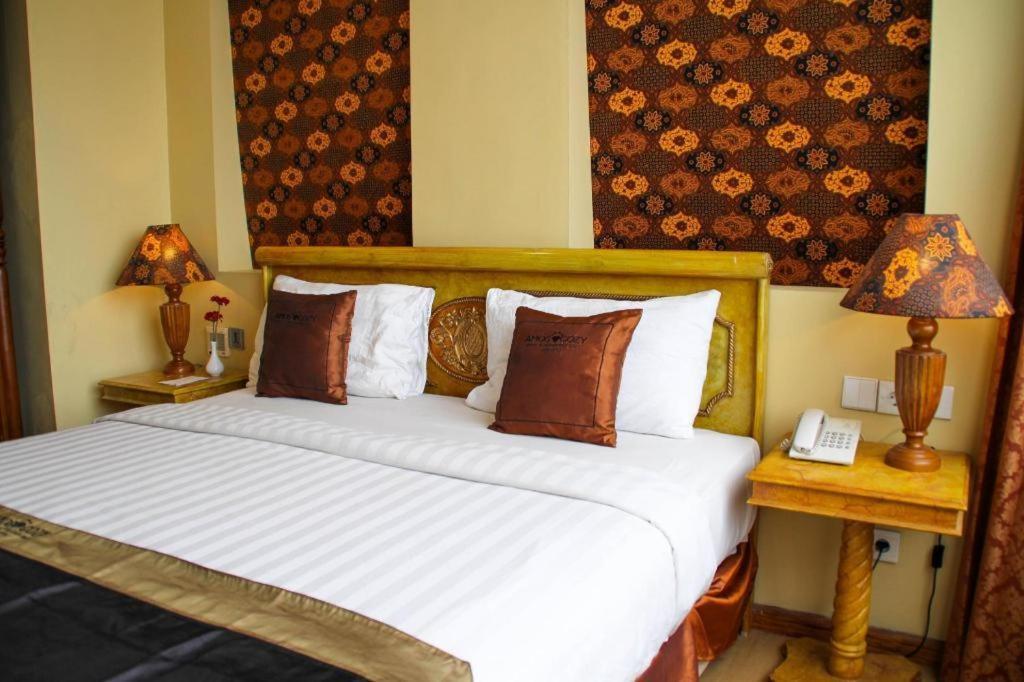 Amos Cozy Hotel Melawai Джакарта Экстерьер фото